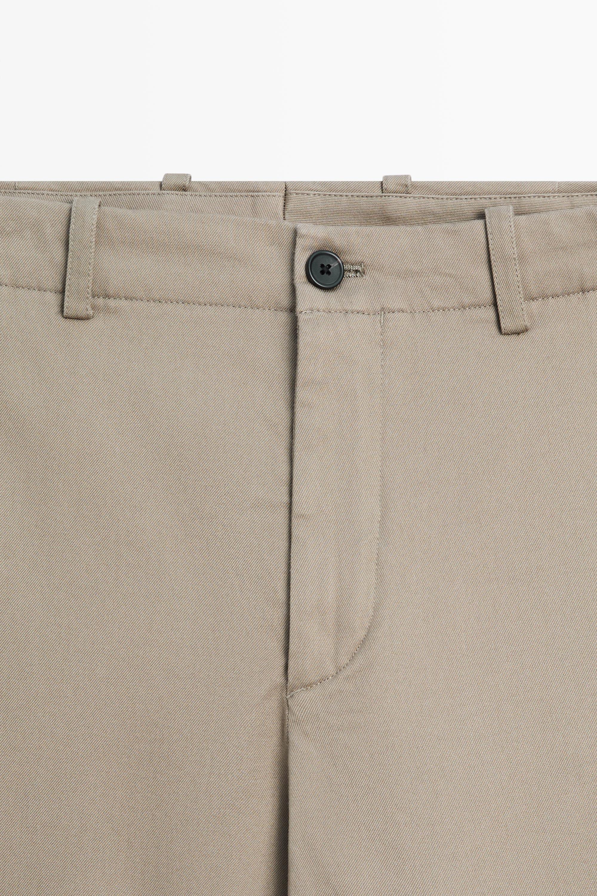 Straight-leg cotton blend pleated pants